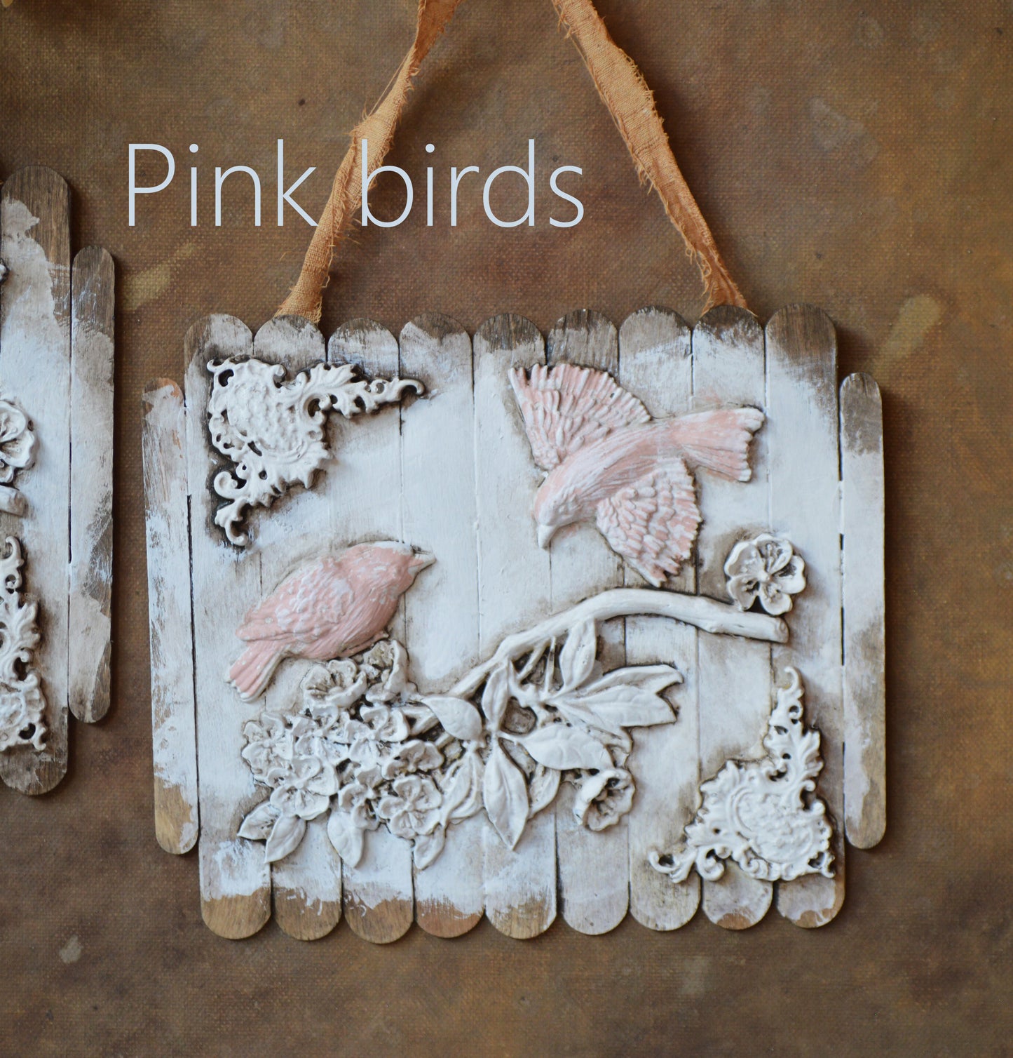 Ornate birds on a branch wall ornaments