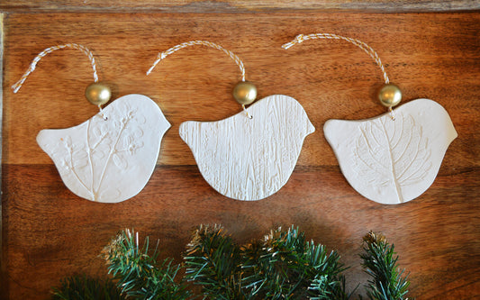 3 pure white bird shaped ornaments