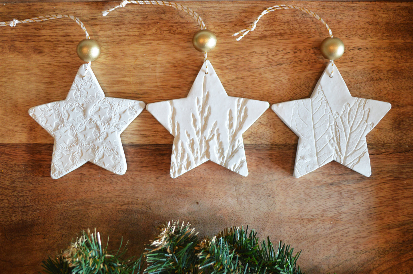 3 pure white star shaped ornaments