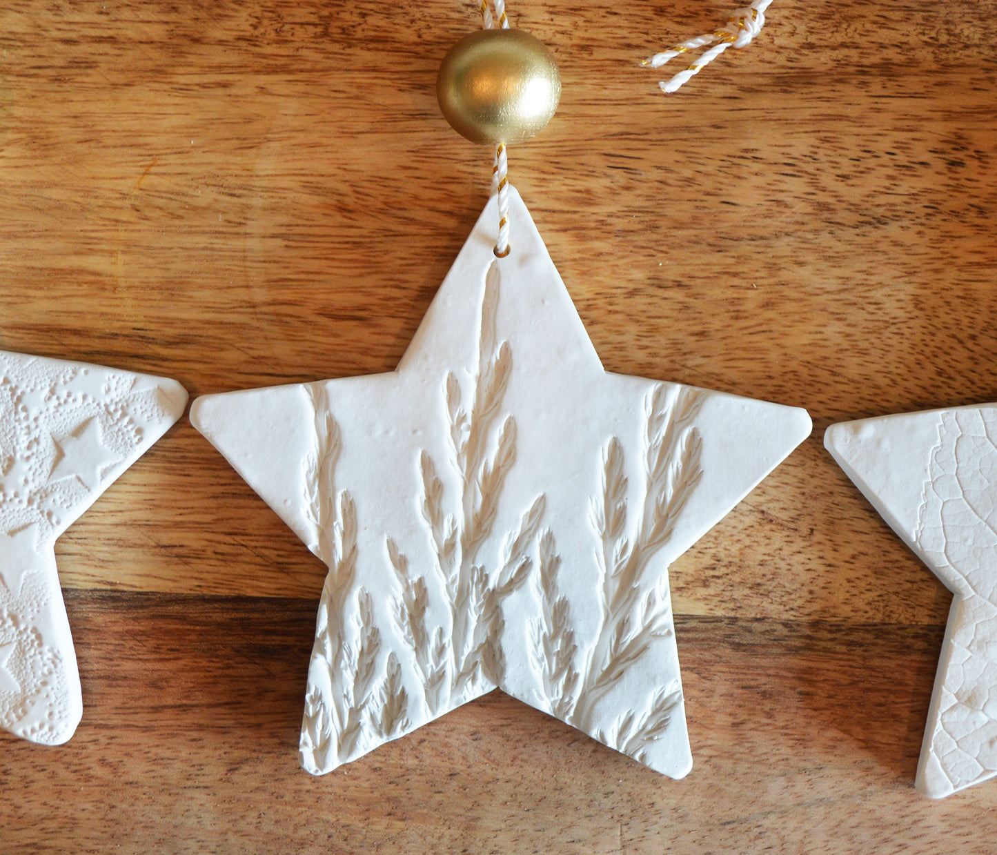 3 pure white star shaped ornaments