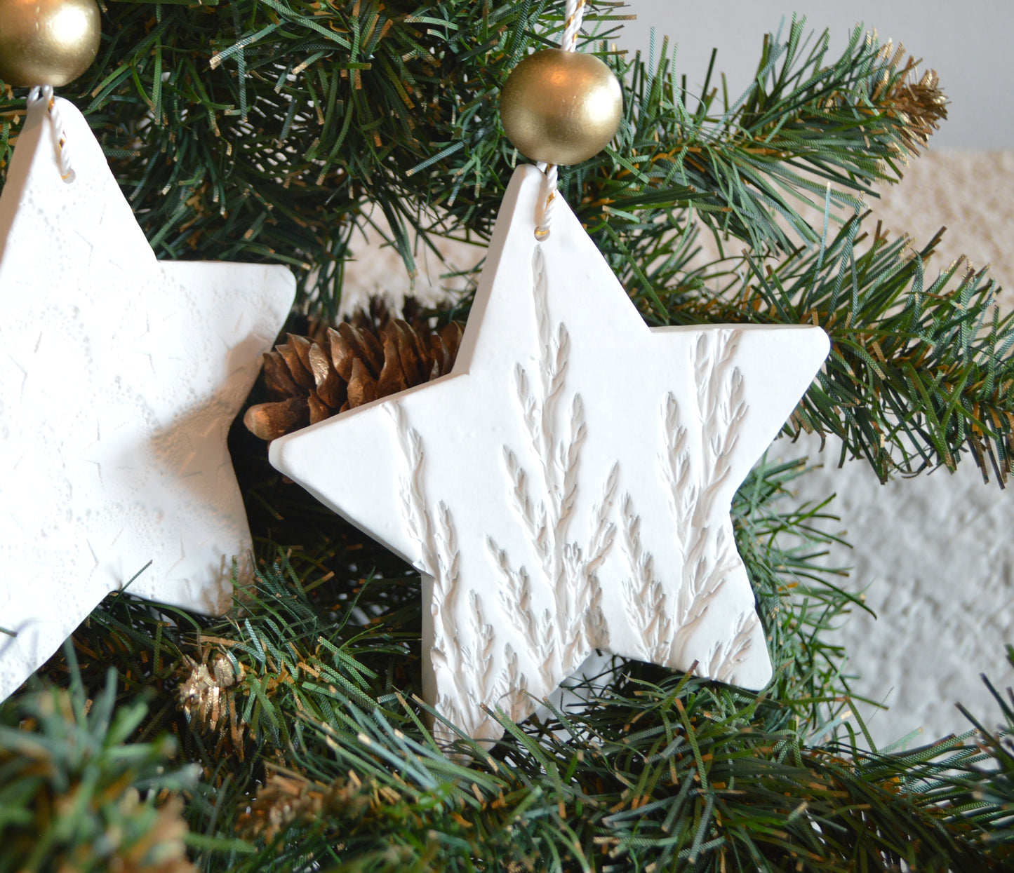 3 pure white star shaped ornaments